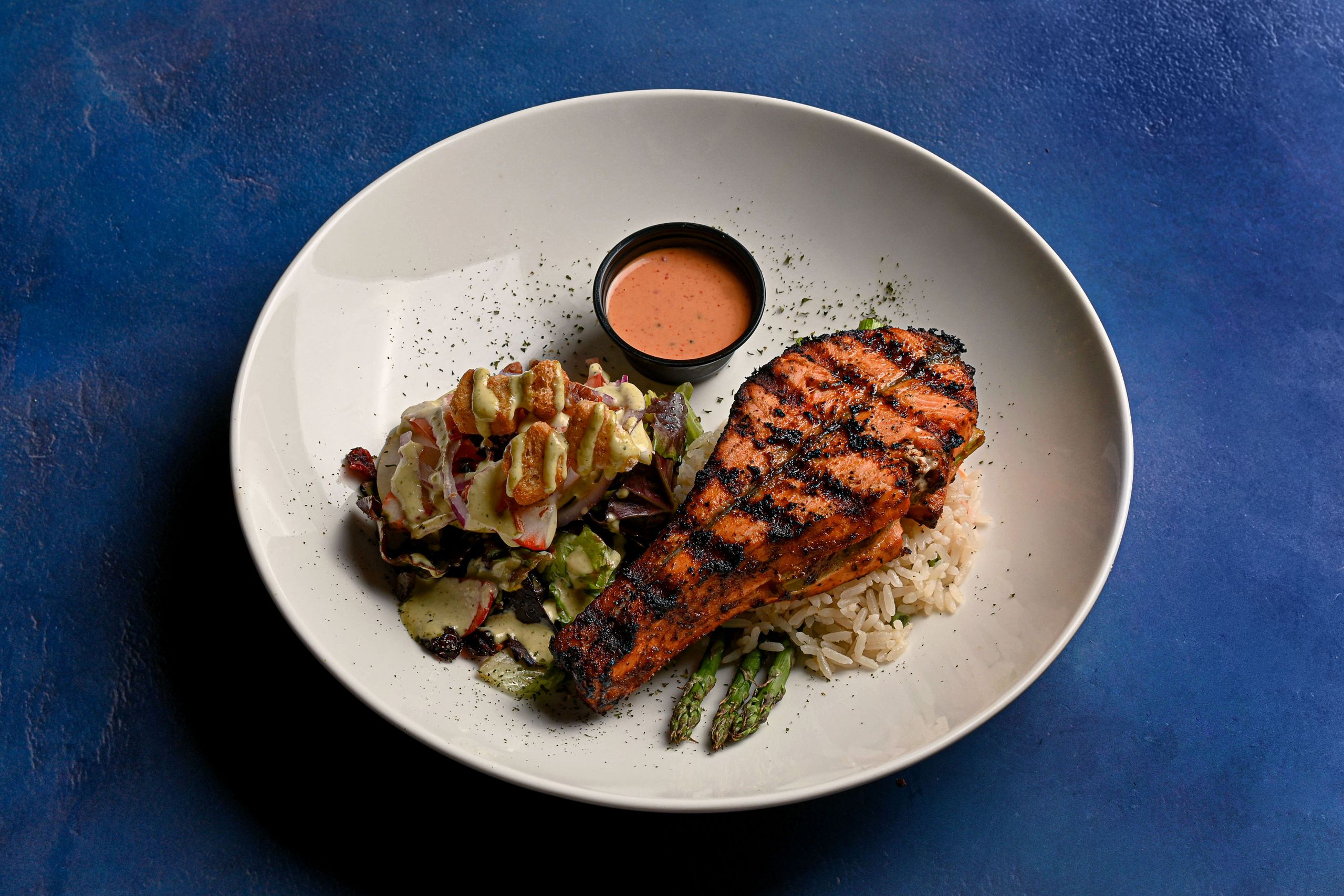 Close-up of a grilled lobster tail with lemon